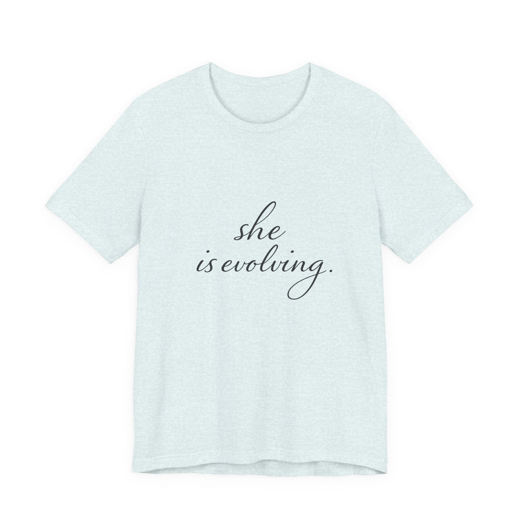 She Is Evolving Tee — Feminine Script Inspirational T-Shirt