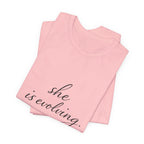 She Is Evolving Tee — Feminine Script Inspirational T-Shirt