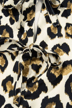 Leopard Bow Tie Front Puff Sleeve Peplum Blouse