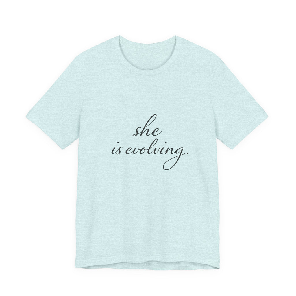She Is Evolving Tee — Feminine Script Inspirational T-Shirt