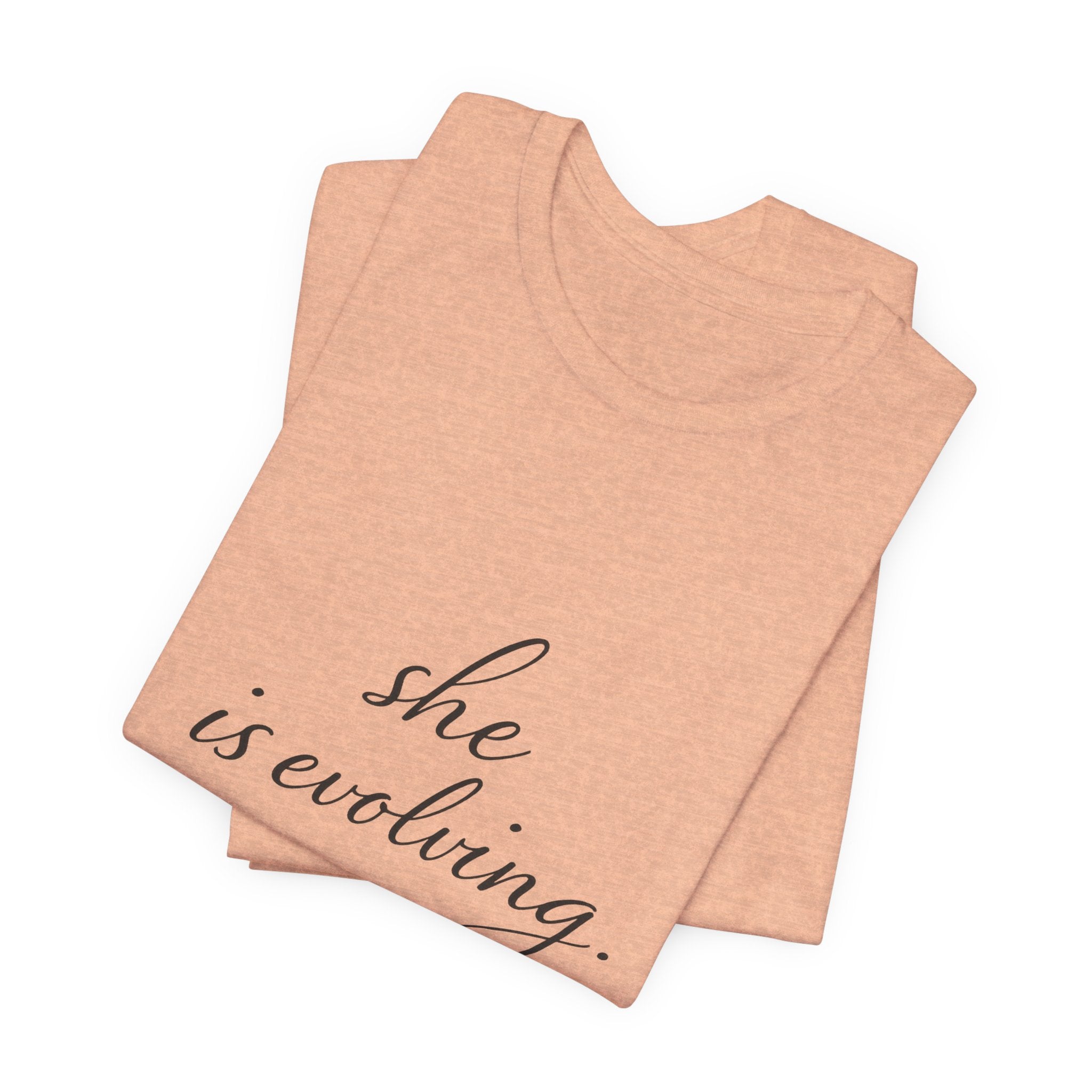 She Is Evolving Tee — Feminine Script Inspirational T-Shirt
