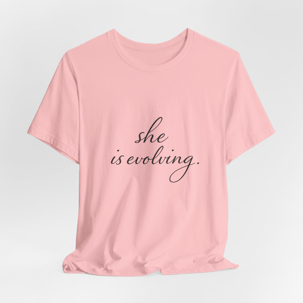 She Is Evolving Tee — Feminine Script Inspirational T-Shirt