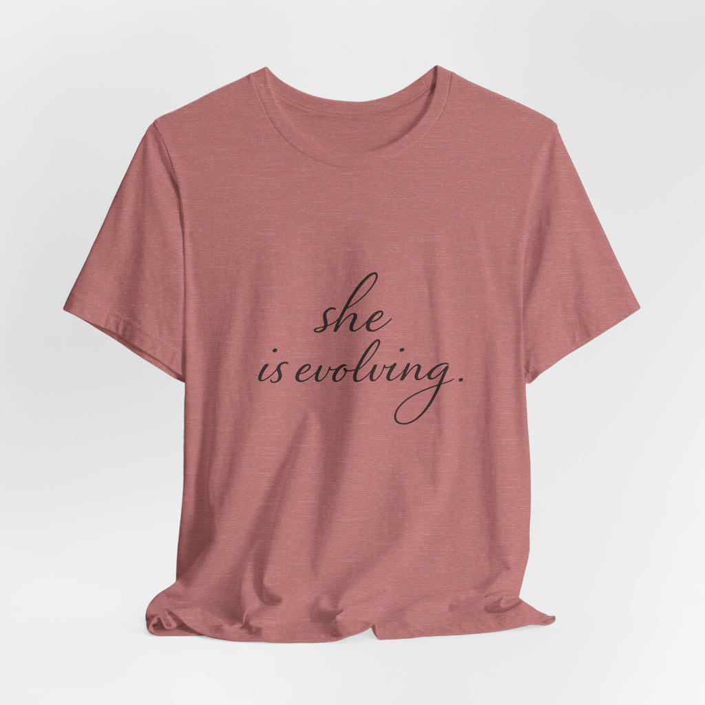 She Is Evolving Tee — Feminine Script Inspirational T-Shirt