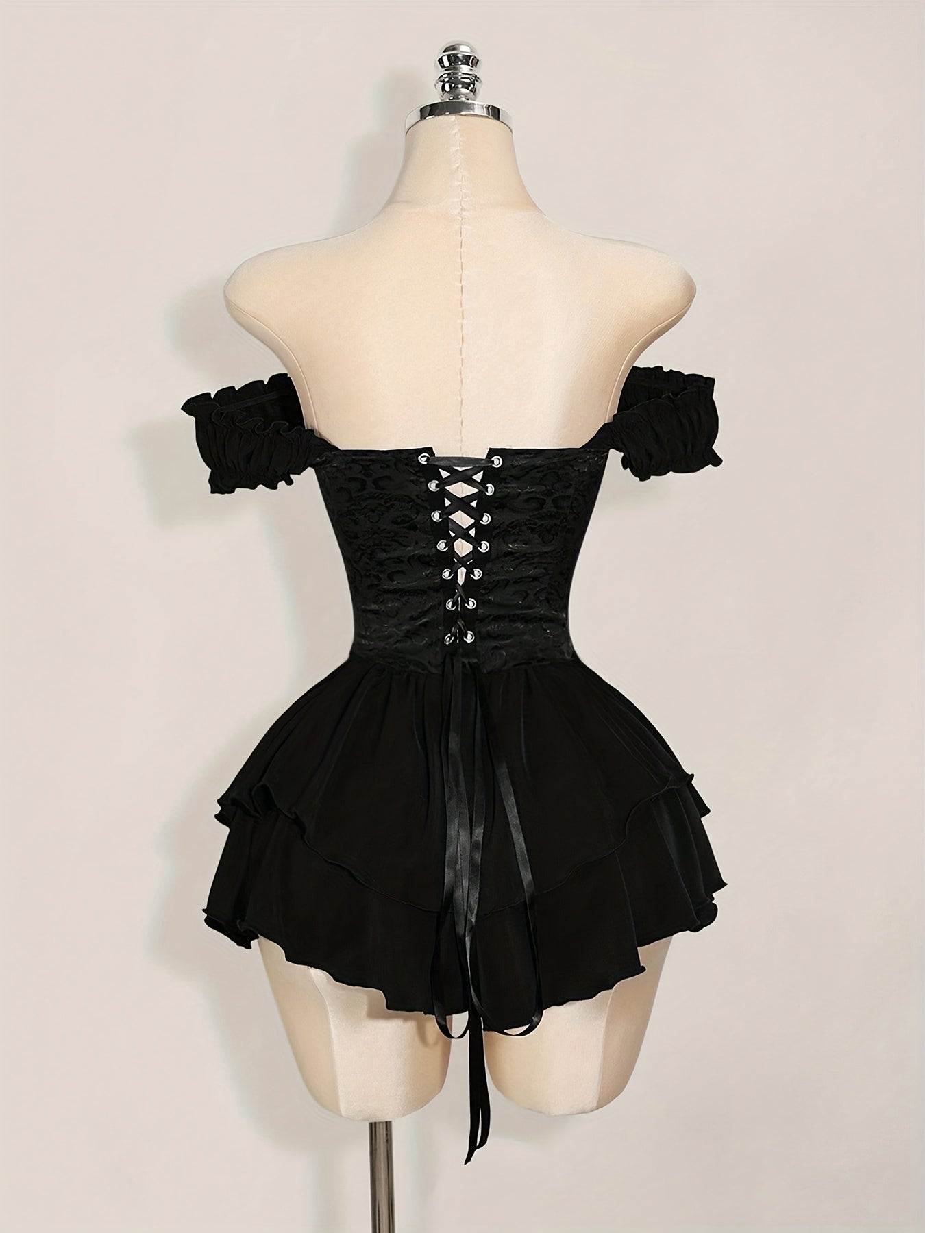 One-Shoulder Dress with a Fitted Waist And Back Tie, Features Puff Sleeves And a Stylish, Elegant Cake Skirt