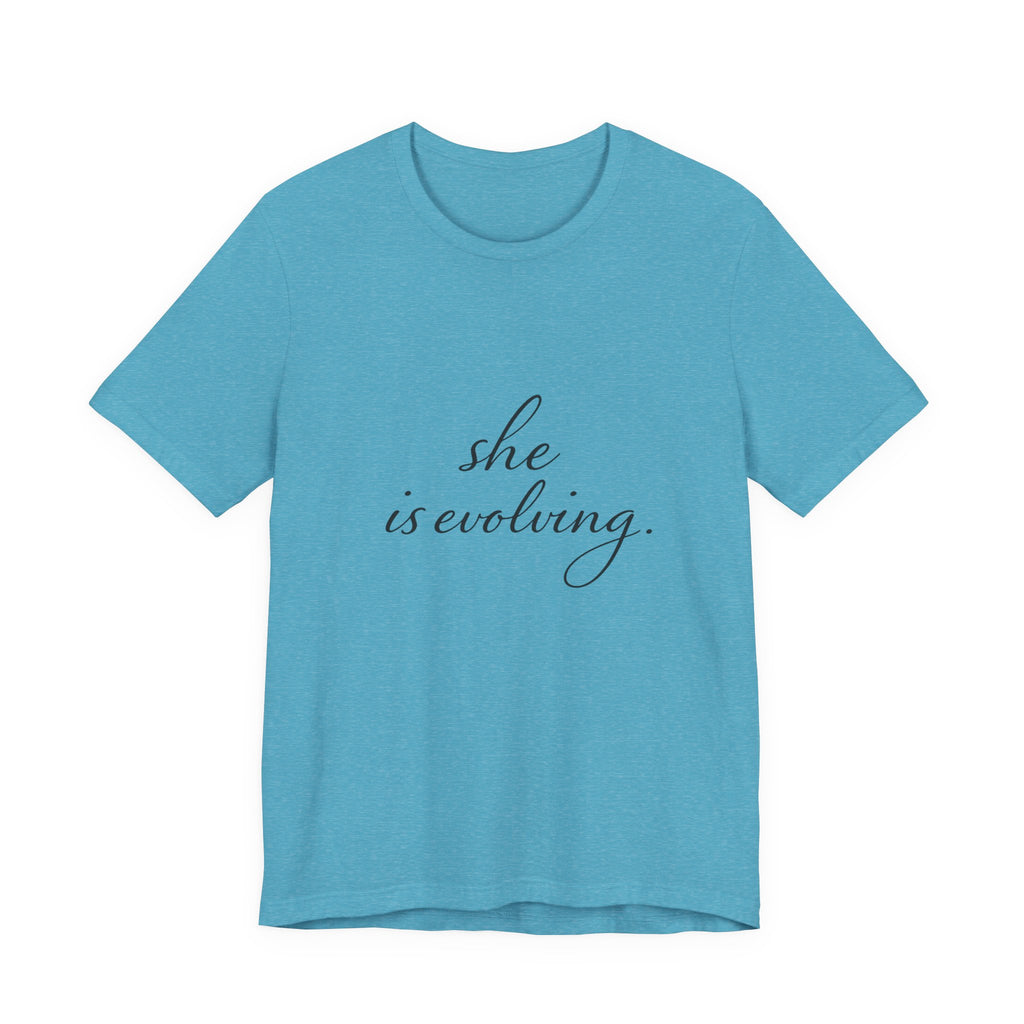 She Is Evolving Tee — Feminine Script Inspirational T-Shirt