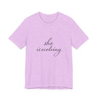 She Is Evolving Tee — Feminine Script Inspirational T-Shirt