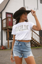 Lindsey Asymmetrical Distressed Shorts- Medium Wash
