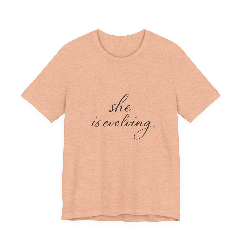 She Is Evolving Tee — Feminine Script Inspirational T-Shirt