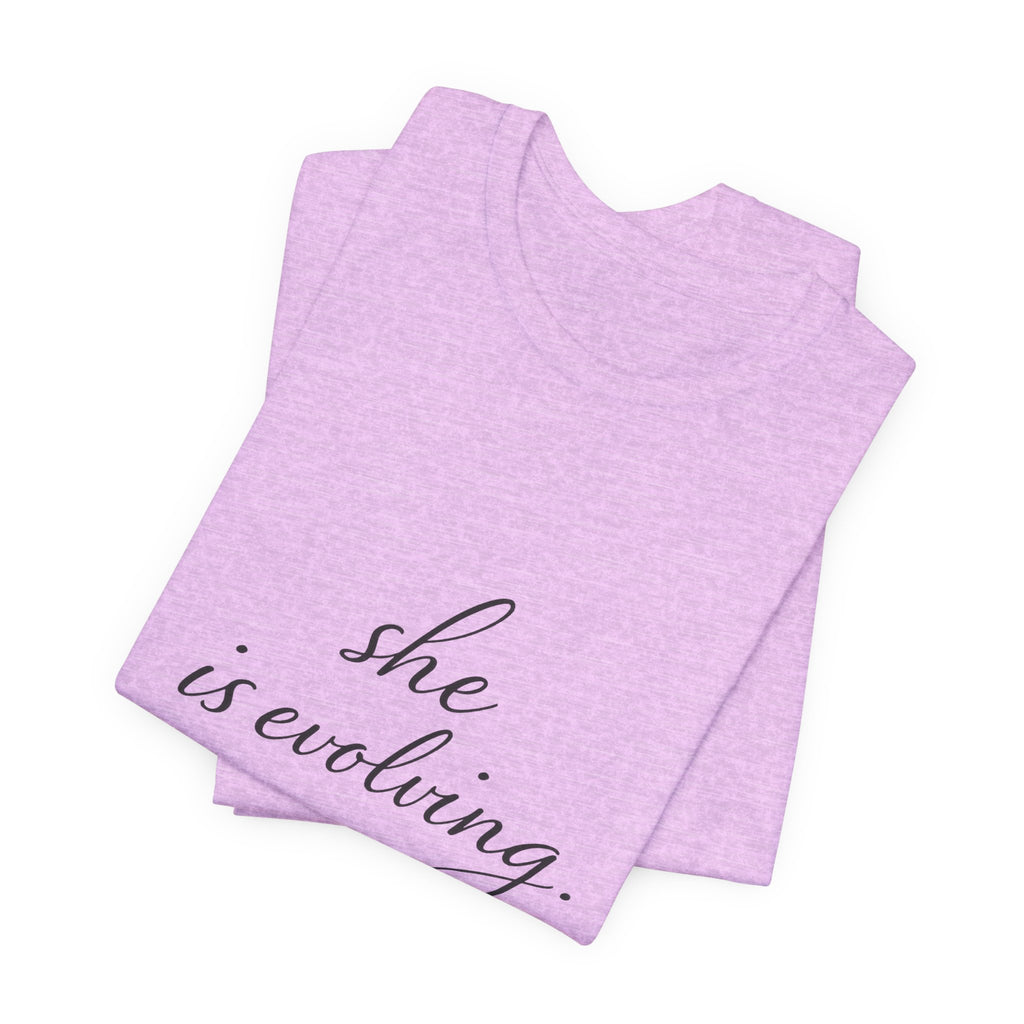 She Is Evolving Tee — Feminine Script Inspirational T-Shirt