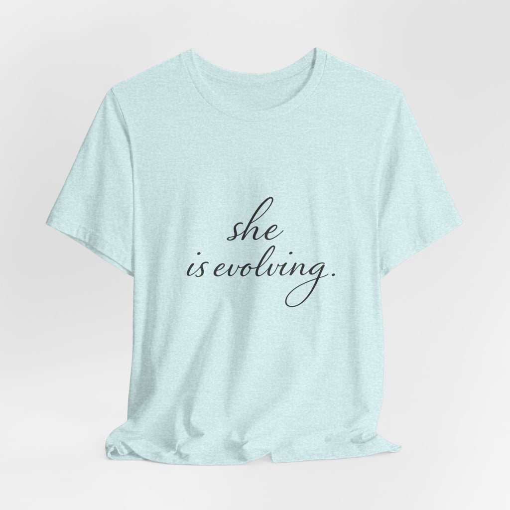 She Is Evolving Tee — Feminine Script Inspirational T-Shirt