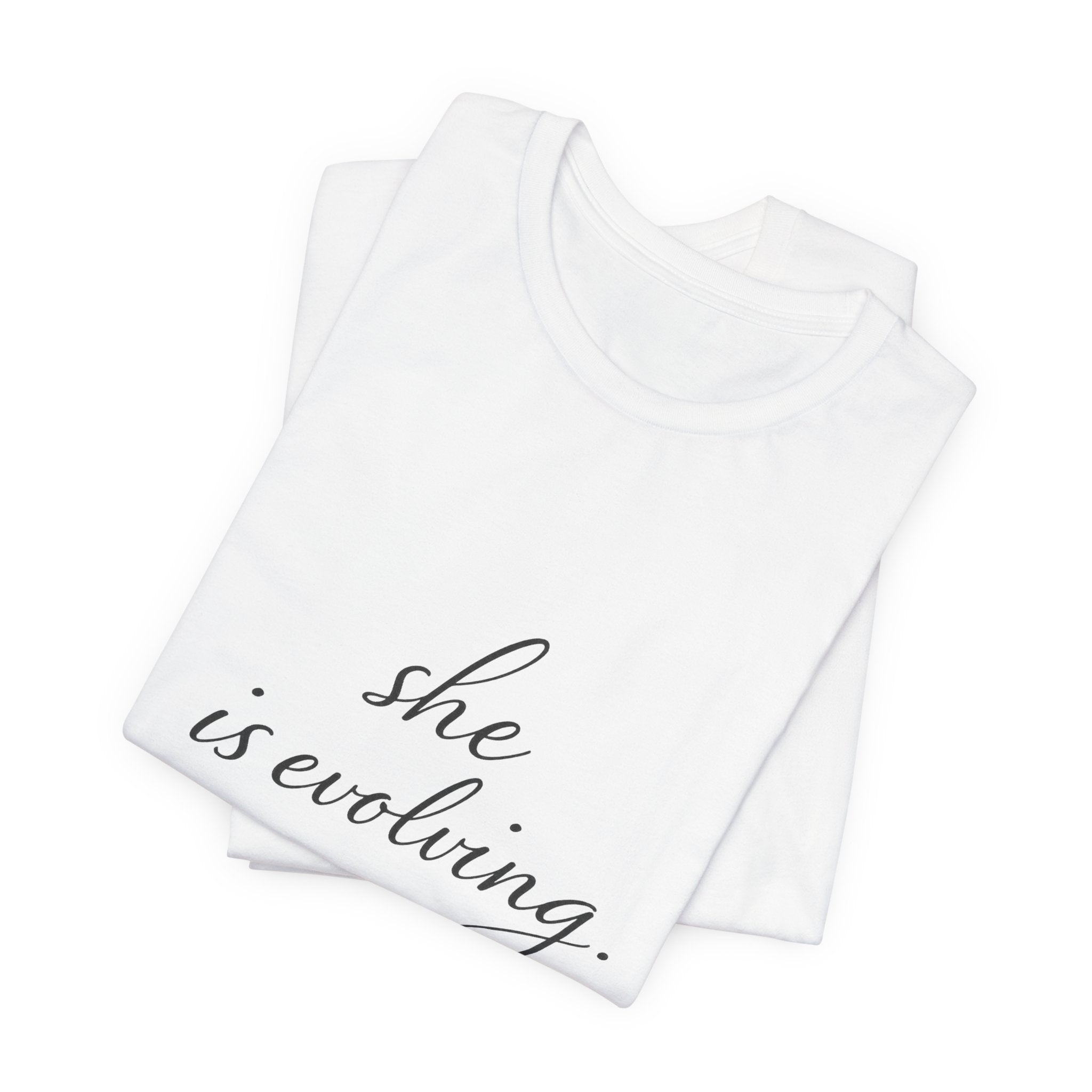 She Is Evolving Tee — Feminine Script Inspirational T-Shirt