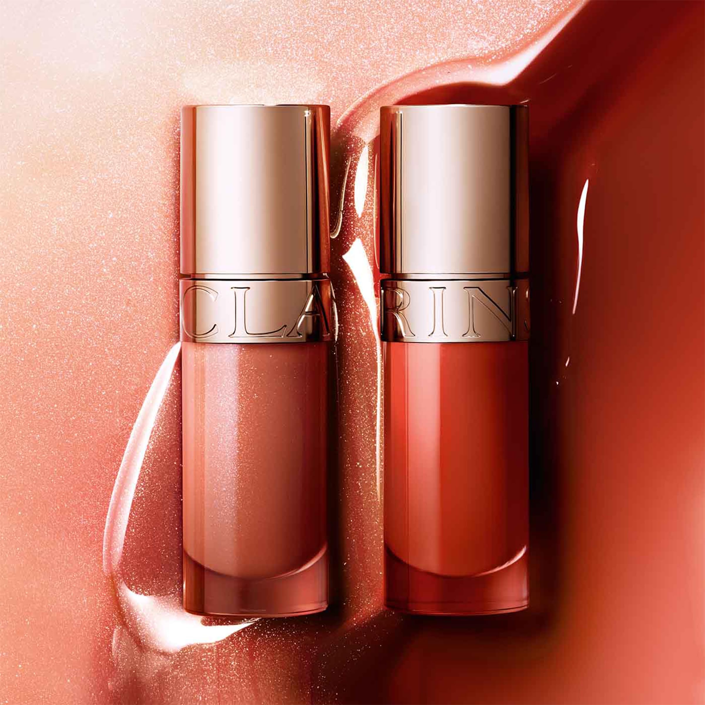 Clarins Lip Comfort Oil | Hydrating, Nourishing and Moisturizing Lip Oil | Sheer, High Shine Finish | Soothes, Comforts and Protects Lips | Visibly Plumps | 93% Natural Ingredients | 0.2 Ounces