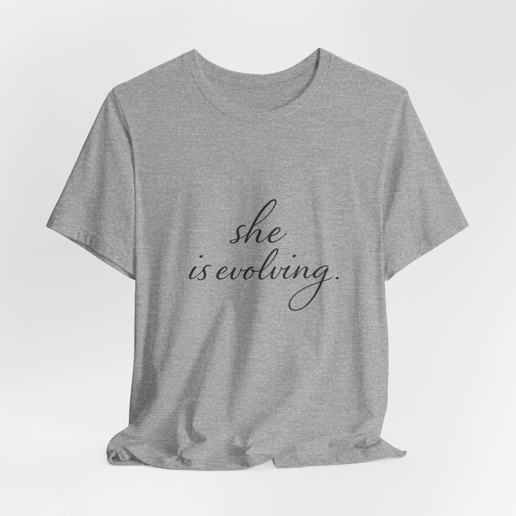 She Is Evolving Tee — Feminine Script Inspirational T-Shirt