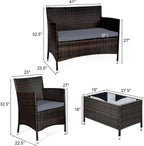Elegant Four-Piece Rattan Patio Set with Soft Cushions