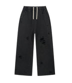 NOIR DESTROYED SWEATPANTS