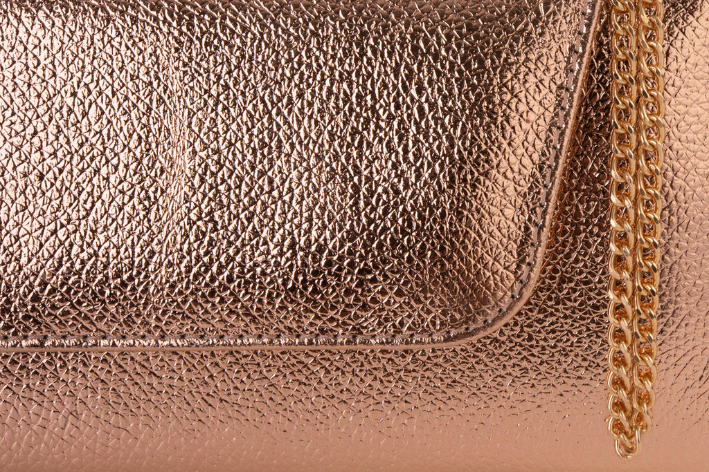 The Ege Rose Gold Leather Clutch