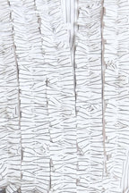 DAYLIGHT EDGE WOVEN TOP