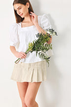 PURE VOLUME WOVEN TOP