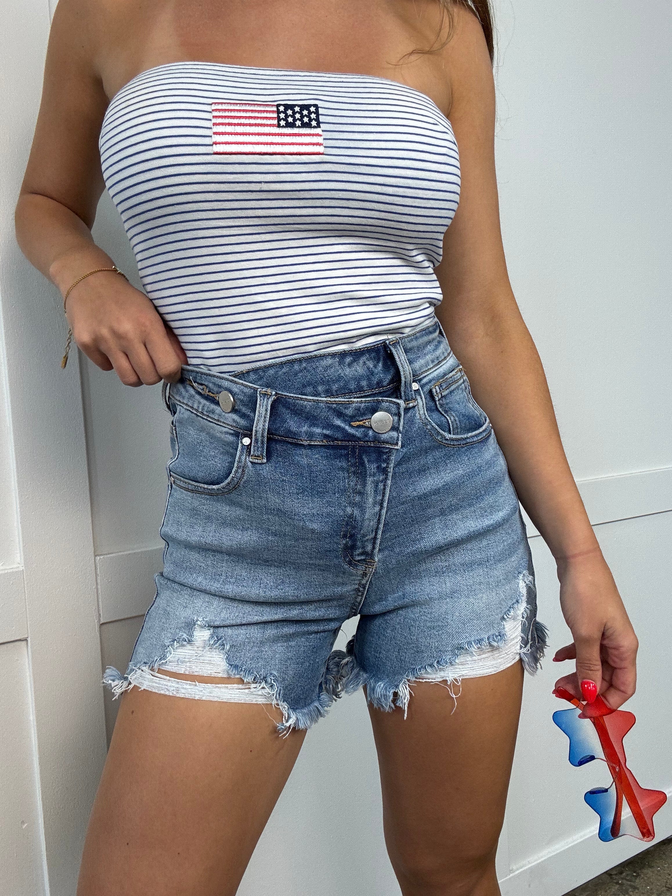 Lindsey Asymmetrical Distressed Shorts- Medium Wash