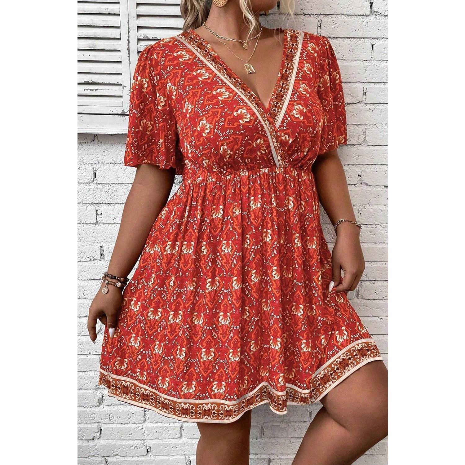 Orange Plus Size Printed Surplice Neck Empire Waist Flowy Mini Dress
