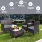 Elegant Four-Piece Rattan Patio Set with Soft Cushions