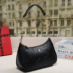 Embossed Letter Dumpling Crossbody Bag