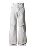 IVORY DISTRESSED BOOTCUT DENIM