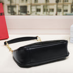 Embossed Letter Dumpling Crossbody Bag