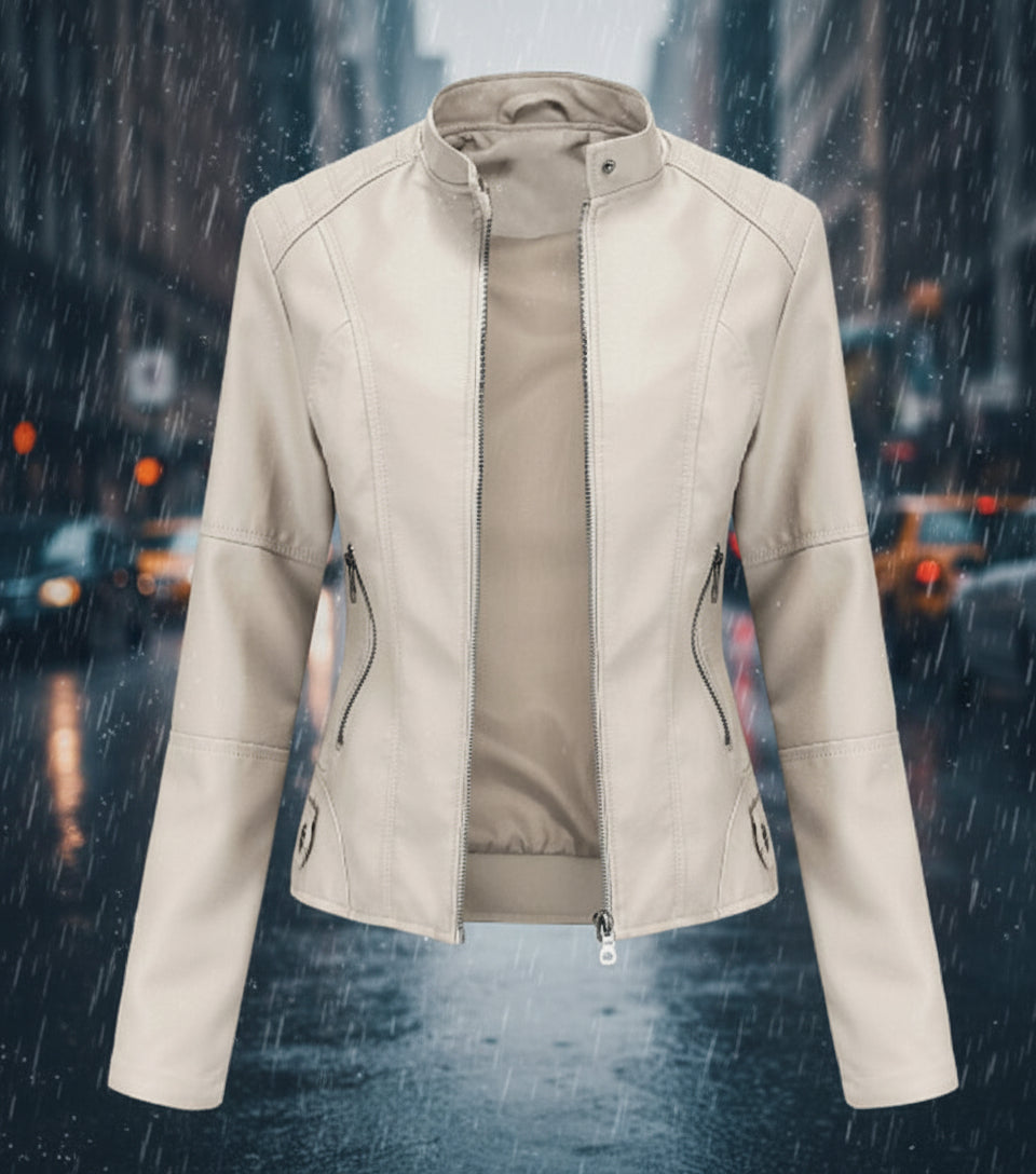 Beige jacket displayed against a blurred city street background