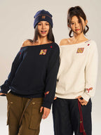 Women’s Slanted Shoulder Embroidered Long-Sleeve Top